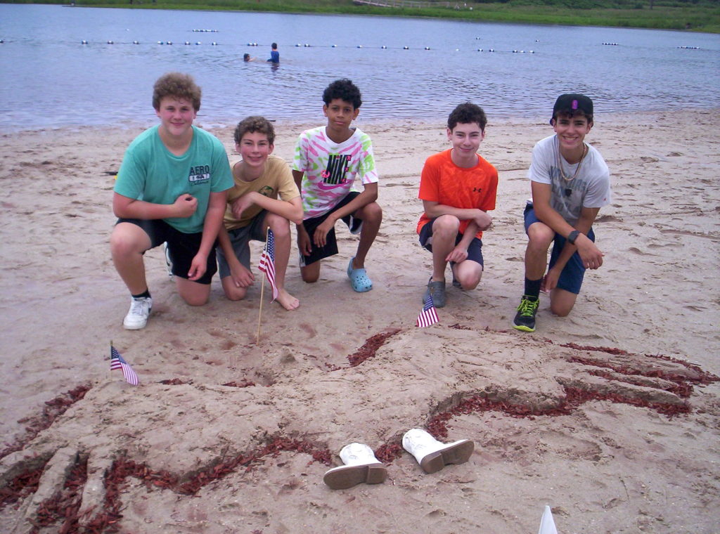 “Stanley,” the cowboy-booted bald eagle, was drawn from the sand by (left to right) Matthew Morris, Owen Pellettier, Harrison Smith, Jack Pellettier and Payton Dempsey.